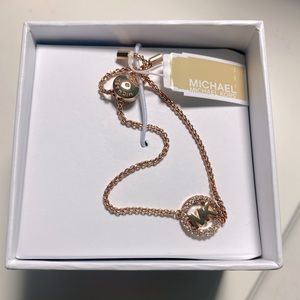Michael Kors gold bracelet with silver gems